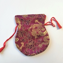 Pochette pendule en brocart bordeaux